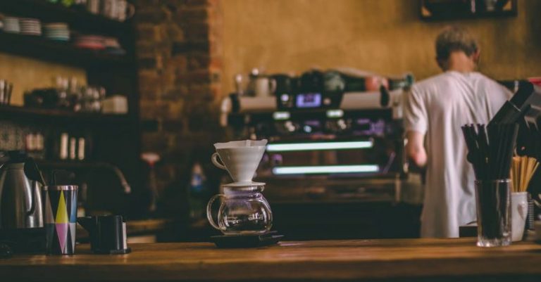 Coffee Maker - Man Standing Beside Commercial Espresso Machine