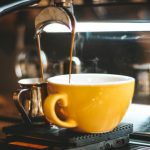 Coffee Maker - Espresso Machine Dispensing on Two Mugs